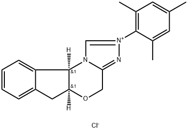 (-)-(5aS,10bR)-5a,10b-Dihydro-2-(2,4,6-trimethylphenyl)-4H,6H-indeno[2,1-b][1,2,4]triazolo[4,3-d][1,4]oxazinium Chloride Monohydrate